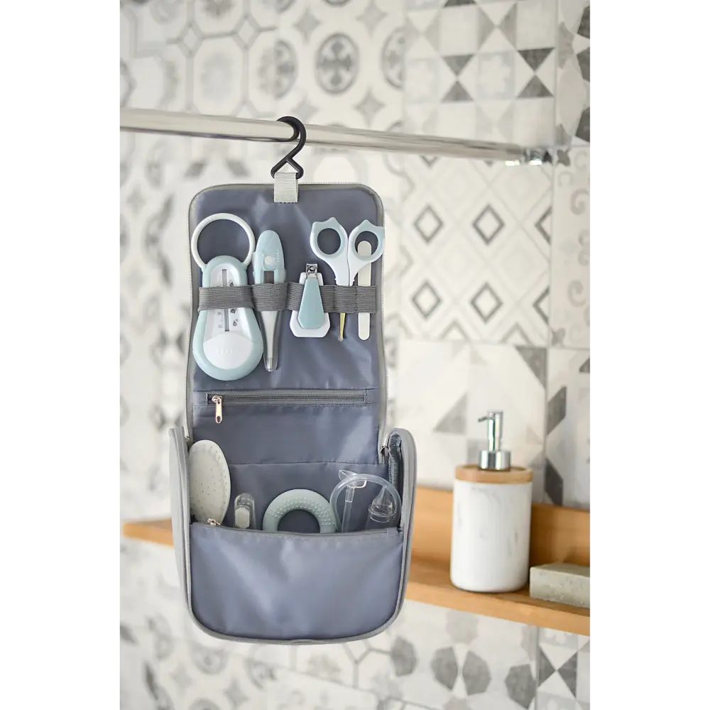 Beaba 9 Baby Toiletry & Grooming Essentials, Includes Thermometer, Hairbrush, Nail Clippers, Nasal Aspirator, Gum Massaging Toothbrush, Teether Baby Scissors, Bath Thermometer, Nail File, and Multi-Compartment Travel Pouch