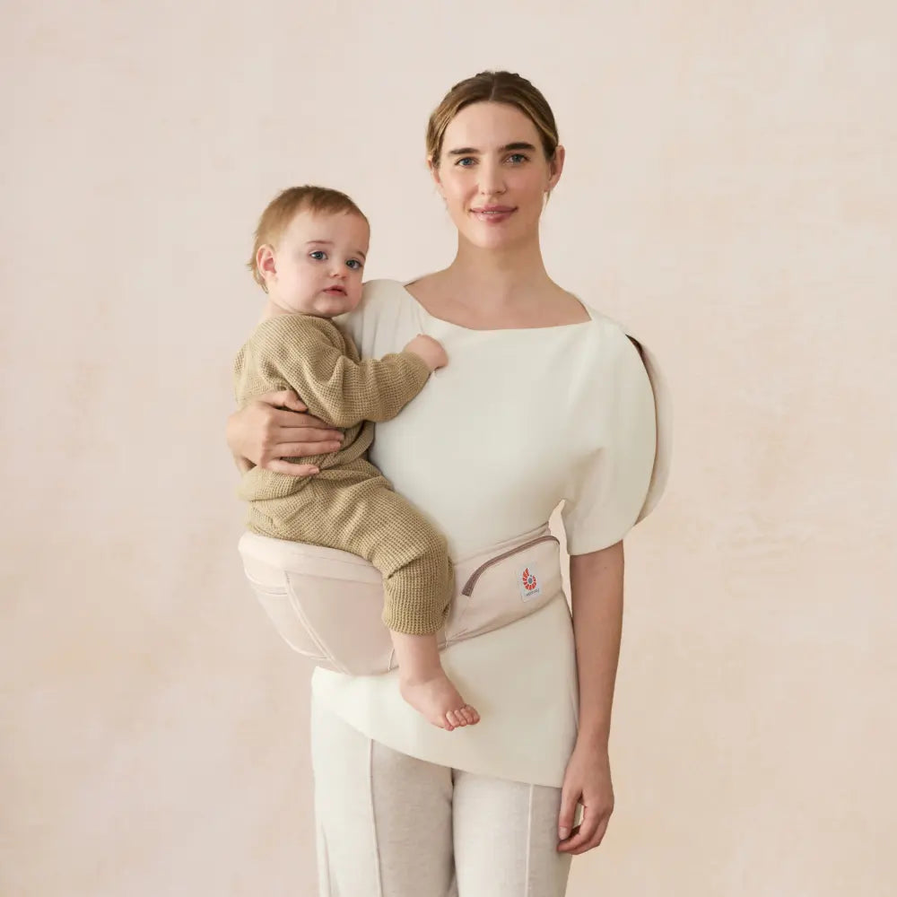 Ergobaby Ergonomic Lift Hip Baby Carrier, 3 Carry Position, Hip Seat with 2 Storage Pockets, Comfortable, Wide Well-Padded Waist Belt and Lumbar Back Support, 7-20 kgs, 6 Months+, Natural Beige