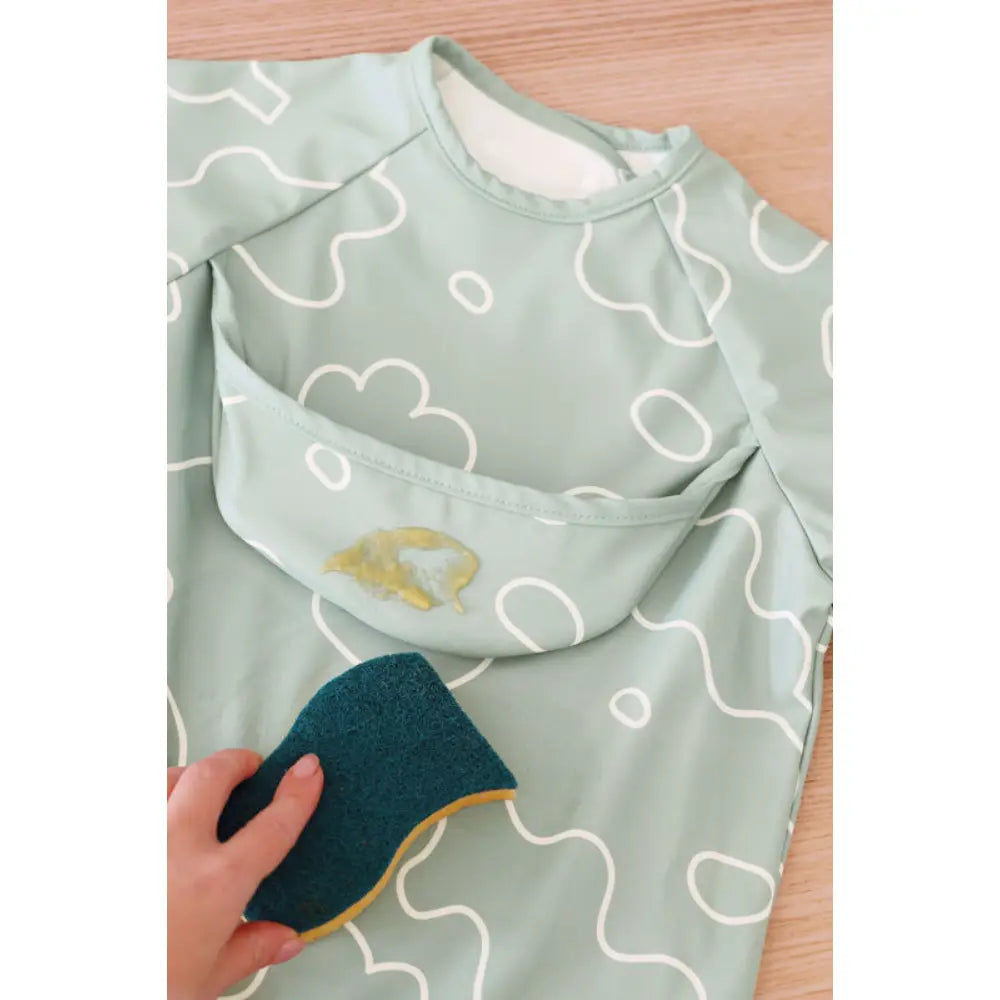 Beaba 2-in-1 Waterproof Bib with Detachable Sleeves, Foldable Food Catcher Pocket, Adjustable Snap Fit & Elastic Cuffs, Soft & Easy-Clean Bib for Feeding & Activities, 4M+