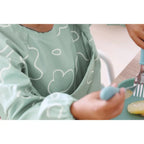 Beaba 2-in-1 Waterproof Bib with Detachable Sleeves, Foldable Food Catcher Pocket, Adjustable Snap Fit & Elastic Cuffs, Soft & Easy-Clean Bib for Feeding & Activities, 4M+