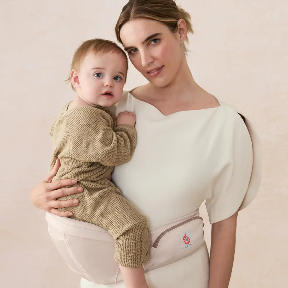 Ergobaby Ergonomic Lift Hip Baby Carrier, 3 Carry Position, Hip Seat with 2 Storage Pockets, Comfortable, Wide Well-Padded Waist Belt and Lumbar Back Support, 7-20 kgs, 6 Months+, Natural Beige